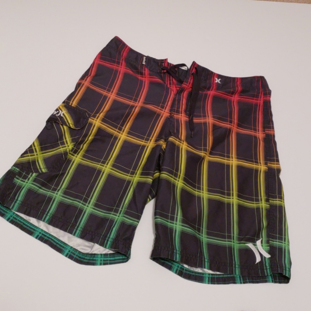 2 pairs of men's swim trunks